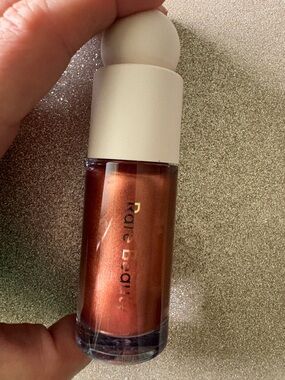 NIB Rare Beauty Positive Light Liquid Luminizer in Captivate (copper)